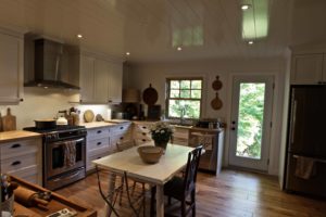 Catchacoma cottage renovation - kitchen and dining looking out to lake