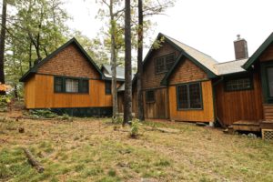 Stoney Lake island cottage renovation - bunkie exterior with cottage