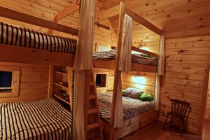 Stoney Lake island cottage renovation - custom bunkbeds in bunkie