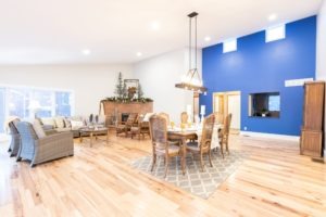 Blue accent wall and dining area